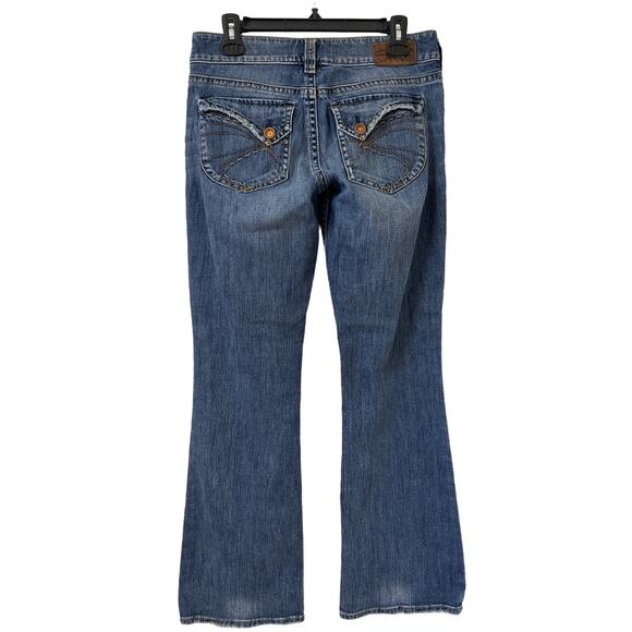Silver Jeans, Suki Surplus 29/32 Distressed Flare Jeans - Picture 3 of 9